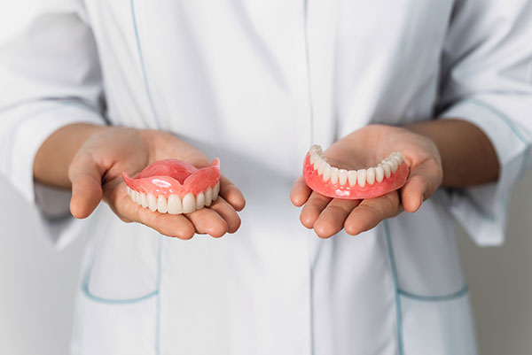 The Importance of Caring for Dentures as Part of Family Dental Habits